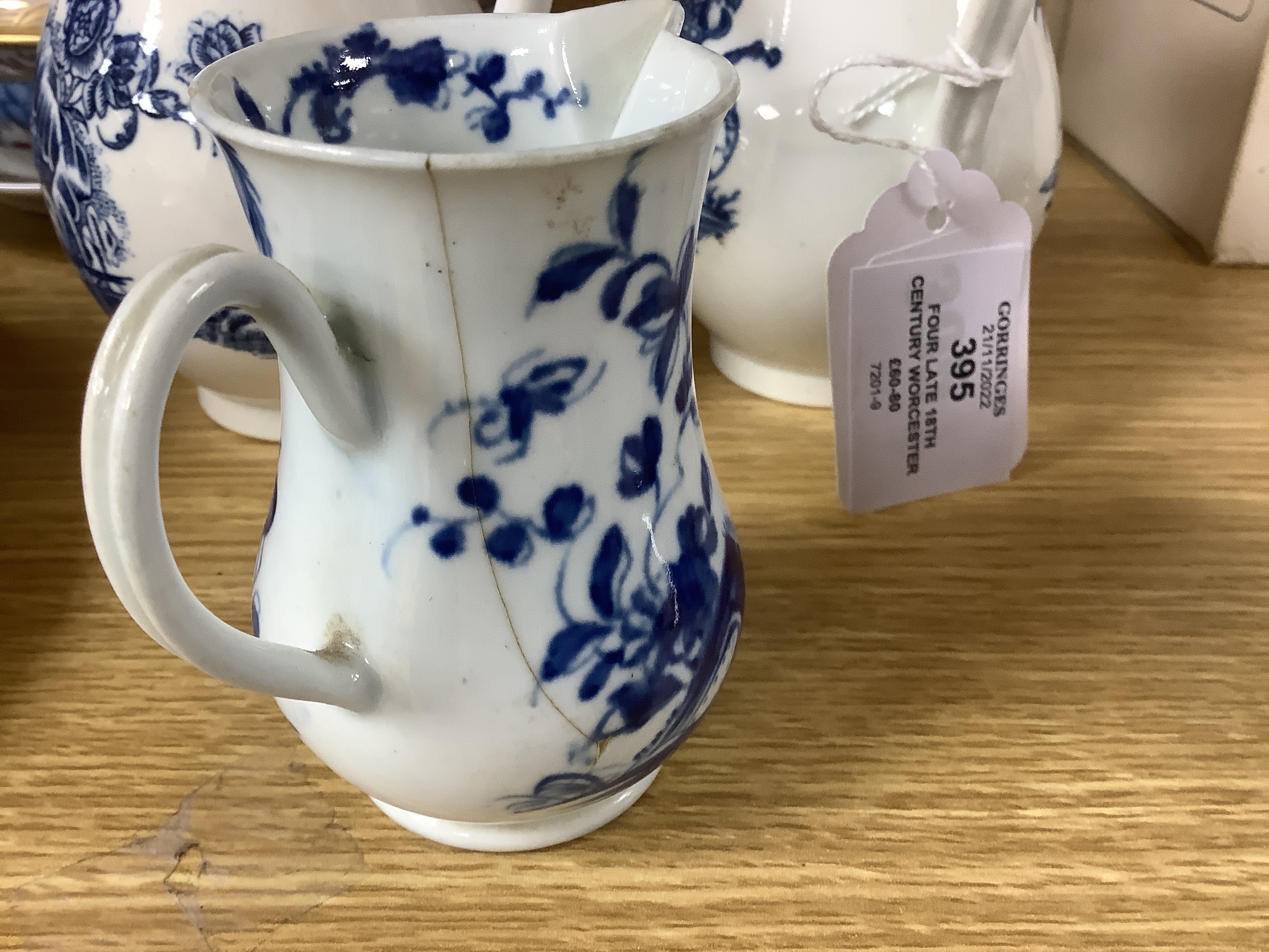 Four late 18th century Worcester blue and white sparrow beak jugs, tallest 12cm